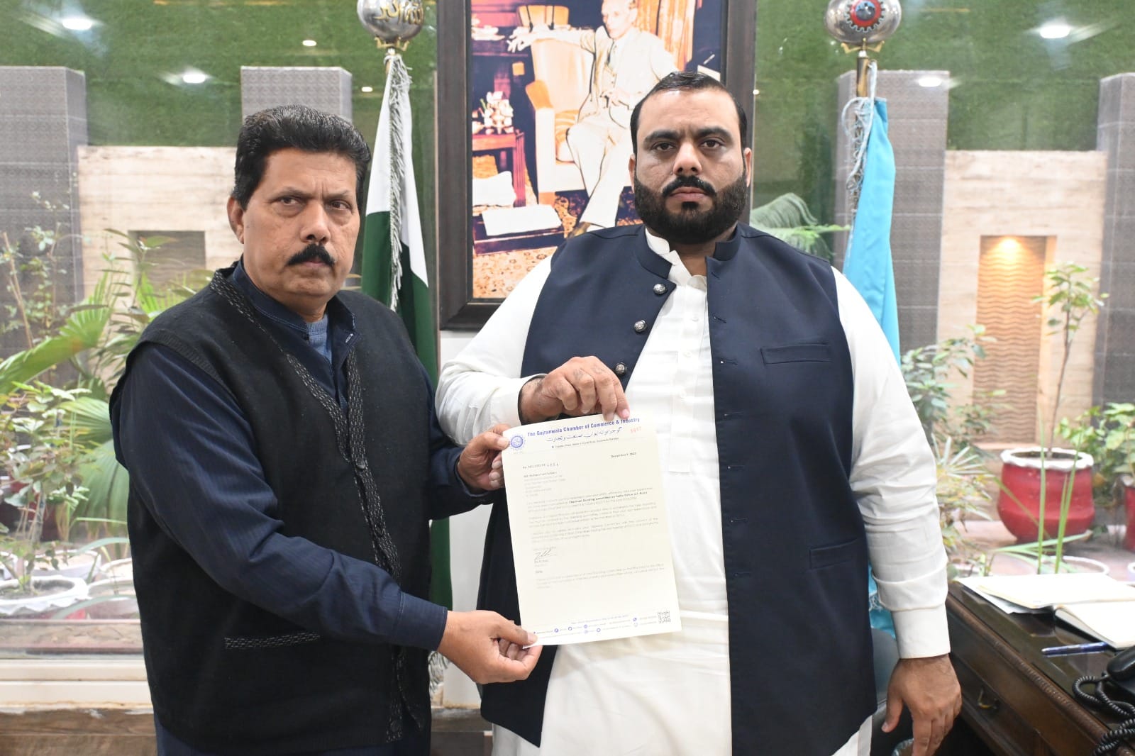 President GCCI presented Chairman Standing Committee Notification to GCCI Member.