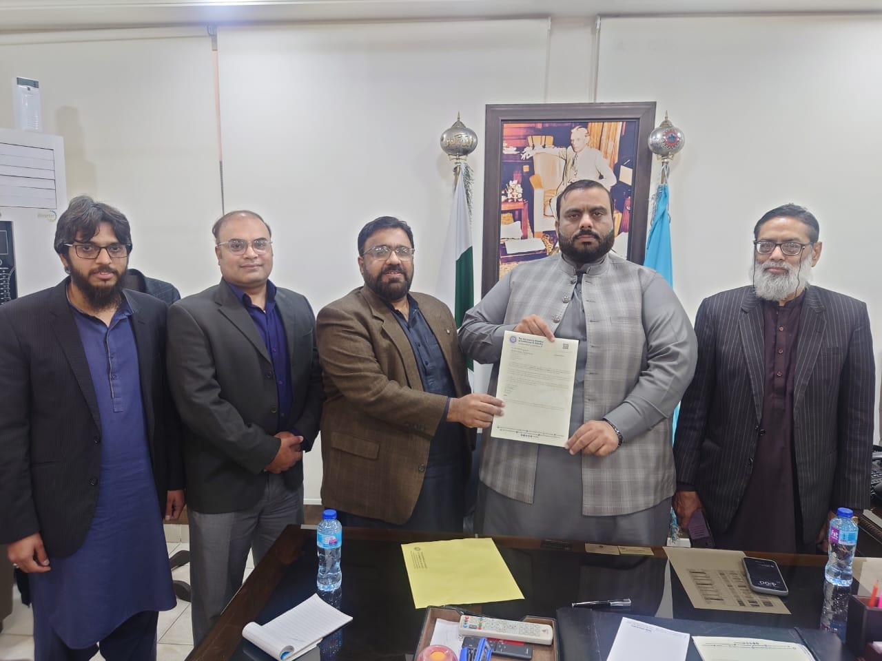 President GCCI presented Chairman Standing Committee Notification to GCCI Member.